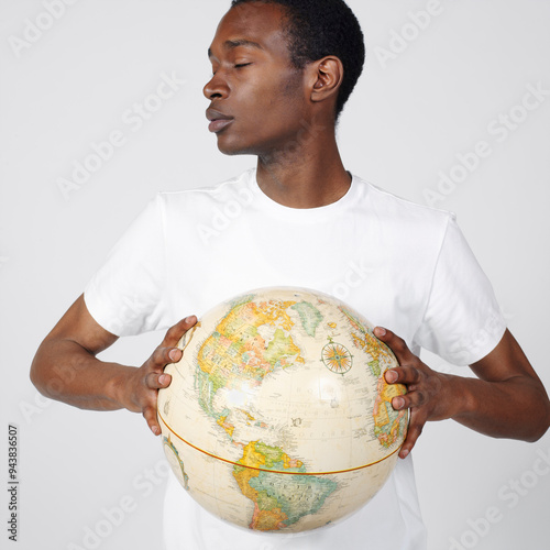 Portrait of Man Holding Globe photo