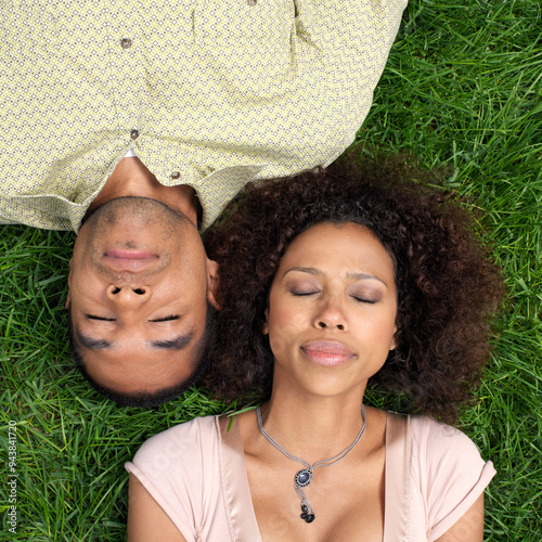 Couple Lying on Grass photo