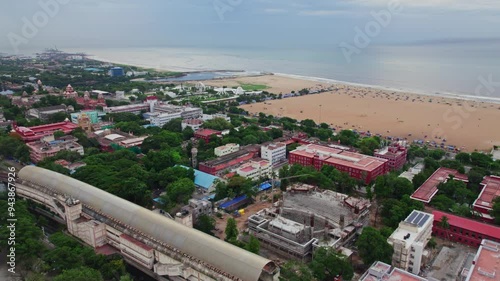 aerial view of marina beach and kamarajar promenade with government buildings, University of Madras, Ezhilagam, Napier Bridge, etc in chennai, tamil nadu, india. drone shot, 4k photo