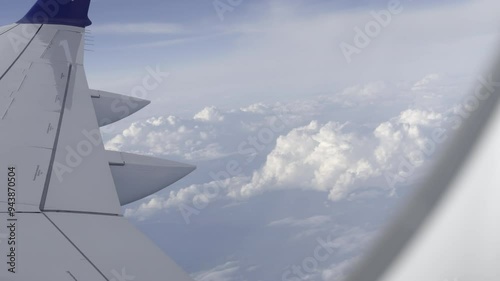 Experiencing turbulence on a commercial flight, looking out the window photo