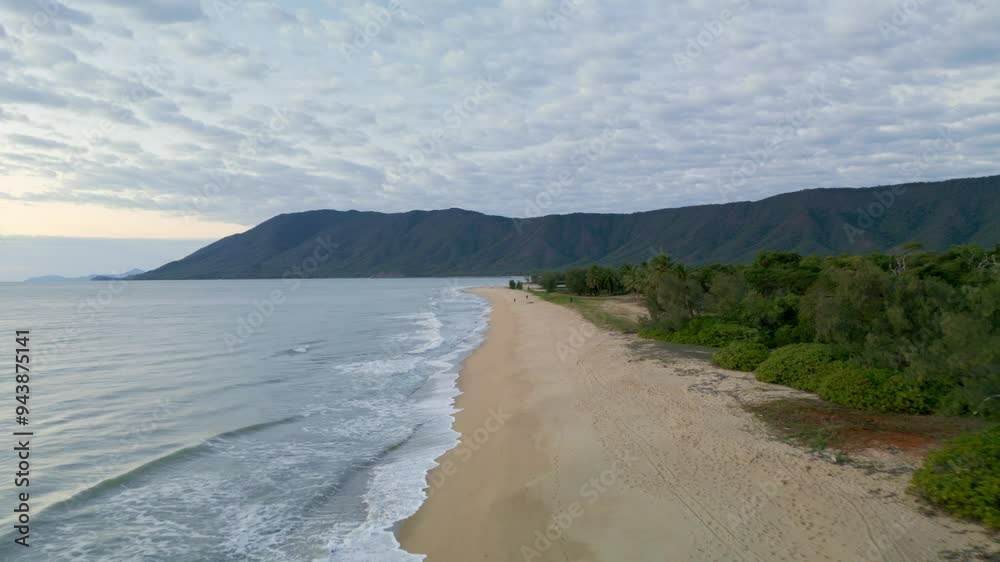 Scenic 4K drone view of Wangetti Beach, ideal for showcasing natural beauty. Scenic 4K drone view of Wangetti Beach, ideal for showcasing natural beauty.
