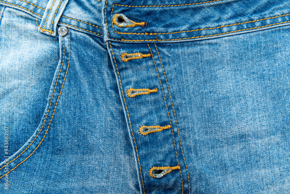 Jeans texture with seams close-up. Denim background. Seam Jeans texture with seams close-up. Denim background. Seam