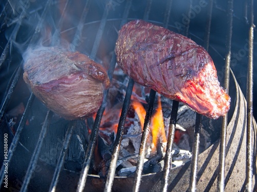 Obraz na płótnie Picanha, or top sirloin cap, steaks on a charcoal grill w salonie