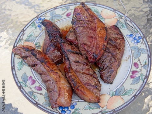 Obraz na płótnie Picanha, or top sirloin cap, steaks on a charcoal grill w salonie