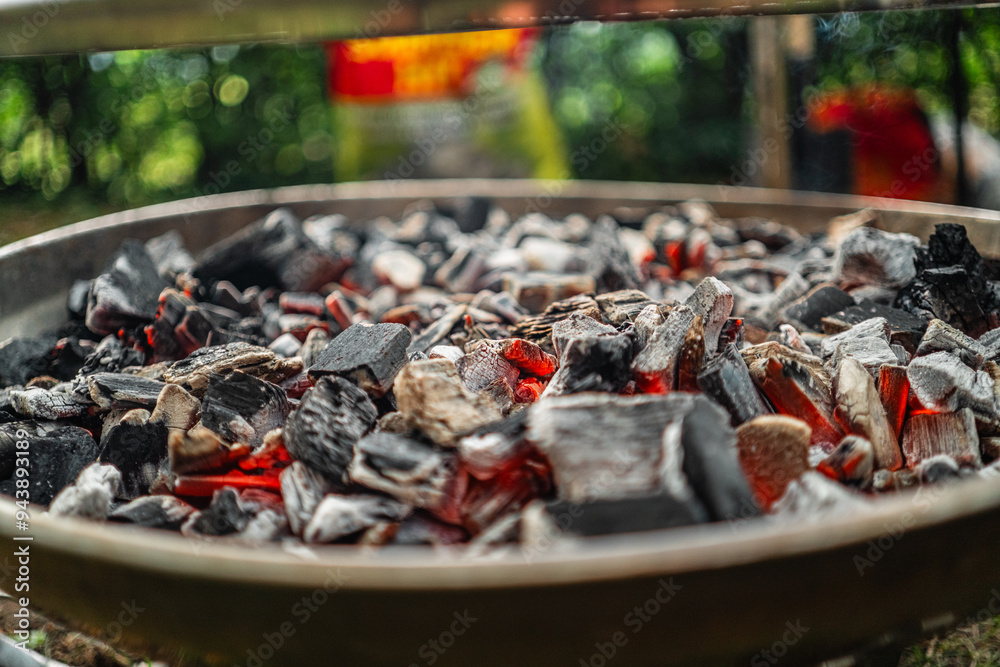 Burning Charcoal in a Grill Bowl Glowing Red Burning Charcoal in a Grill Bowl Glowing Red