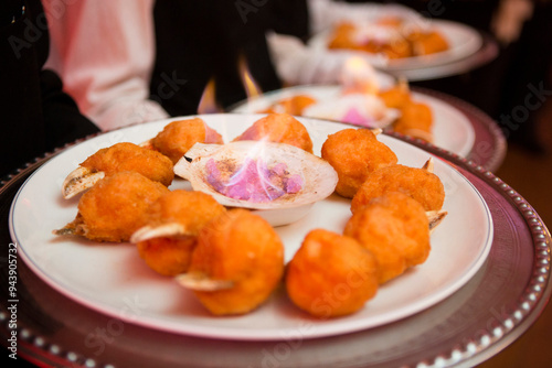 Close-up of traditional Chinese crab appetizers on platter, wedding reception, Ontario, Canada photo