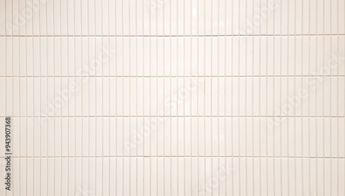 close up image of white beige ceramic clay wall tiles use as background with blank space for design. interior wall finishing material. metro tiles background. subway brick in vertical pattern.