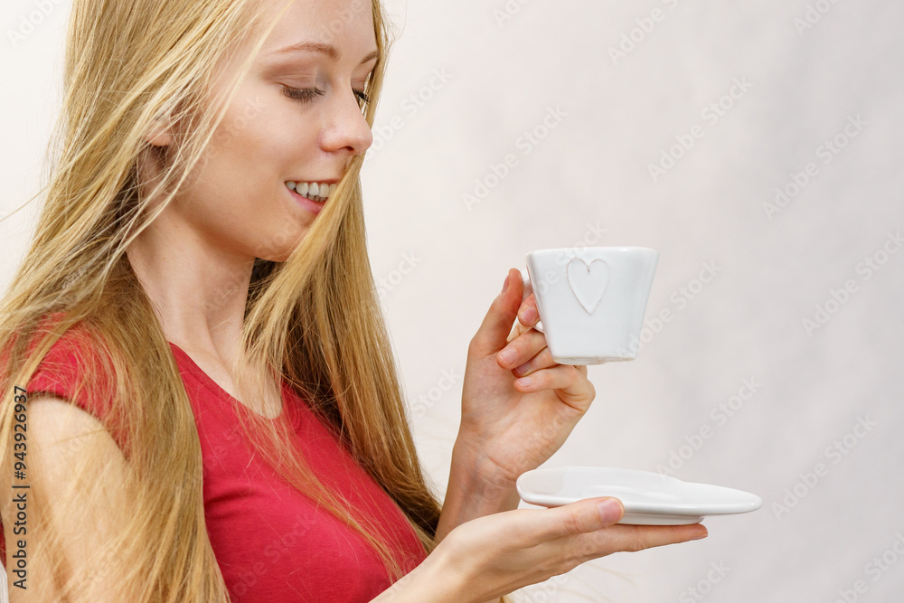Blonde girl with coffee cup Blonde girl with coffee cup
