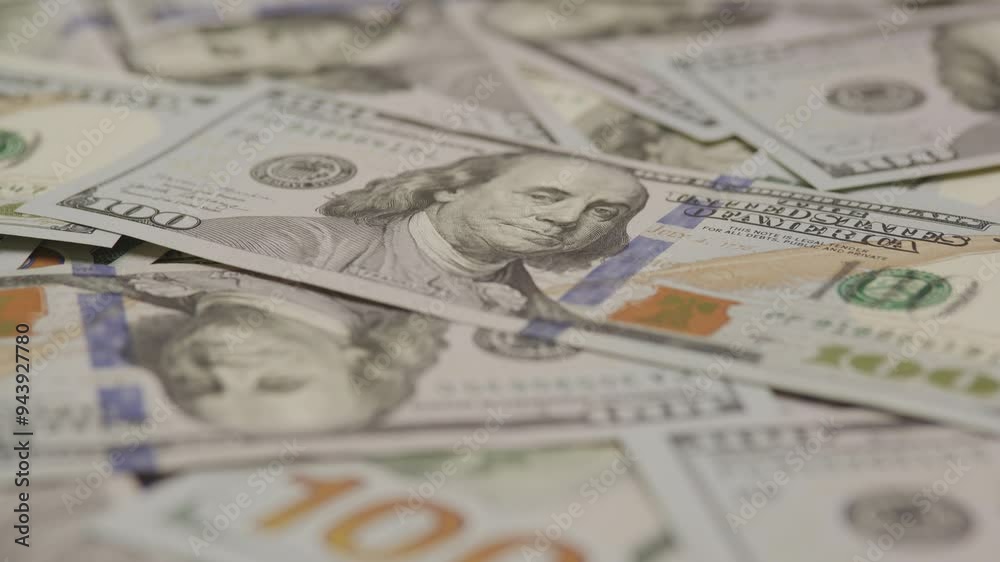 Close-up of US dollar bills in a scattered arrangement Close-up of US dollar bills in a scattered arrangement