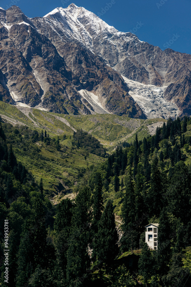 Beautiful scenery along the Rohtang Pass with rugged mountains and lush vegetation in the Western Himalayas; Manali, Himachal Pradesh, India Beautiful scenery along the Rohtang Pass with rugged mountains and lush vegetation in the Western Himalayas; Manali, Himachal Pradesh, India