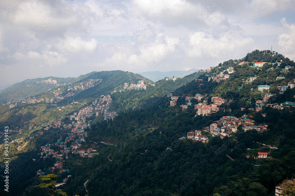 Shimla, the capital city of Himachal Pradesh, India, with housing on a hillside; Shimla, Himachal Pradesh, India Shimla, the capital city of Himachal Pradesh, India, with housing on a hillside; Shimla, Himachal Pradesh, India