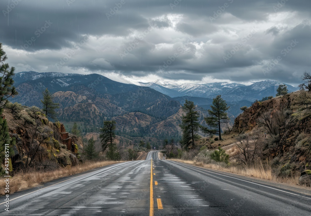 Fototapeta premium Road Trip Through Mountains with Rainy Clouds