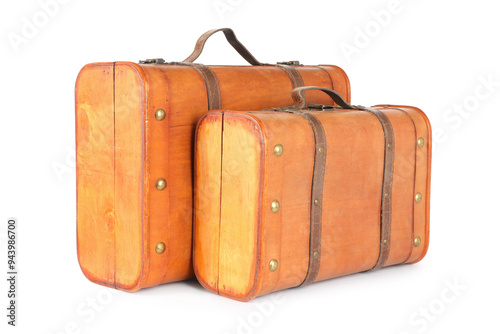 Two new wooden suitcases isolated on white