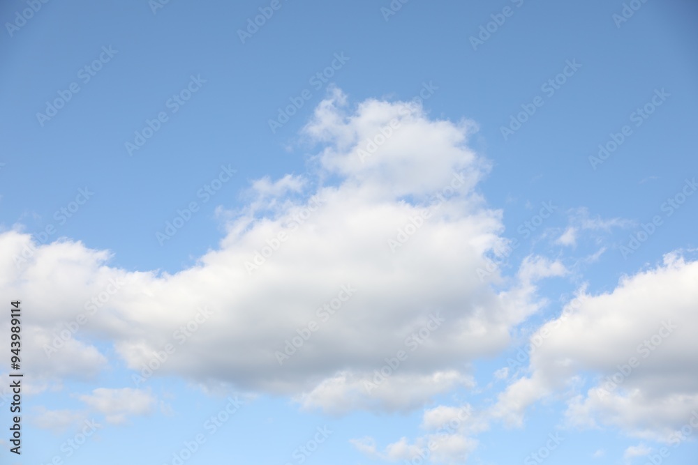 Picturesque view of blue sky with fluffy clouds Picturesque view of blue sky with fluffy clouds