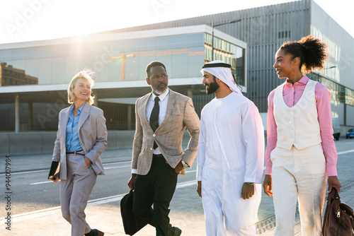 Photography Group of multiethnic business people meeting an emirati businessman - Internatio