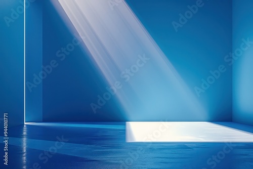 A blue room with a window that lets in sunlight