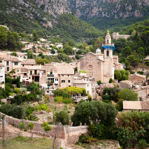 View of the town of Valdemossa nestled in the Serra de Tramuntana mountains on the Spanish island of Majorca photo