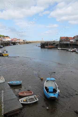 Whitby North Yorkshire UK 21st August 21 2024 Whitby a British seaside town  with boats moored in the harbour on a  hot summers