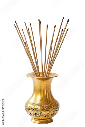 A decorative brass vase holds a collection of incense sticks, creating an inviting atmosphere for relaxation and mindfulness. Transparent background PNG photo