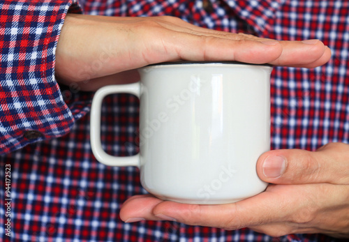 hand holding milk jug