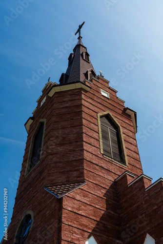 A brick church in the distance. Old church in Stowbtsy photo