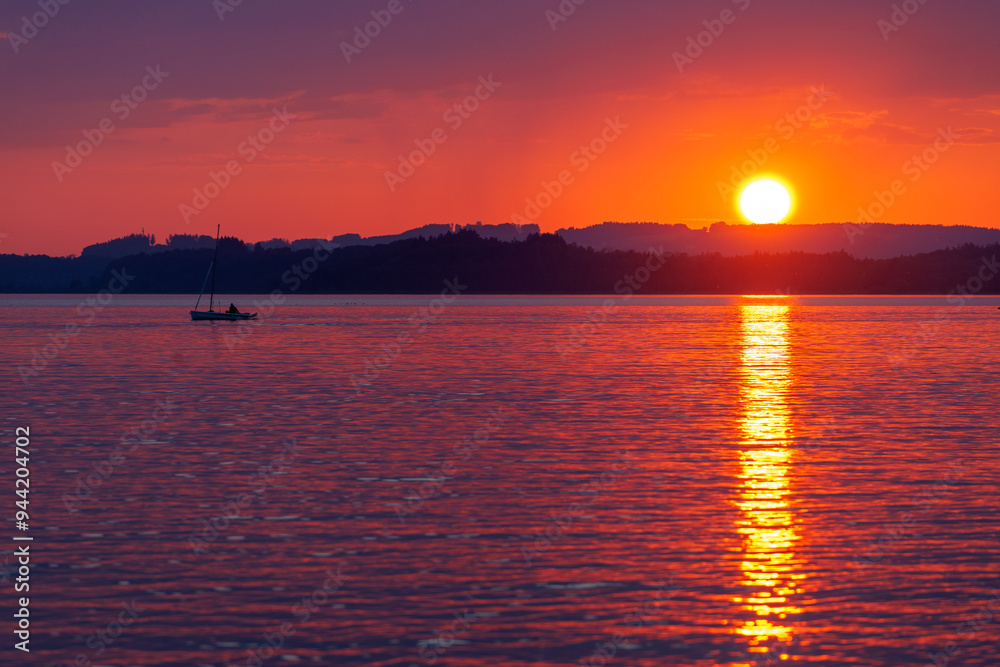 Sunset over the Chiemsee Lake, Bavaria, Germany Sunset over the Chiemsee Lake, Bavaria, Germany