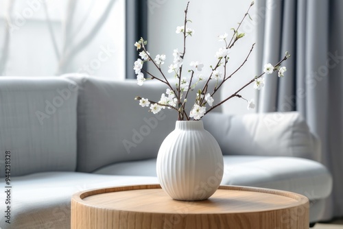 ceramic vase on table in bright living room photo