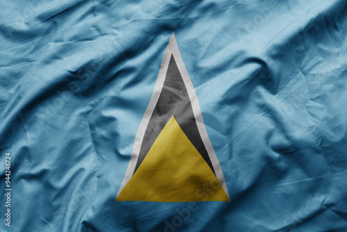 waving colorful realistic national flag of saint lucia . photo