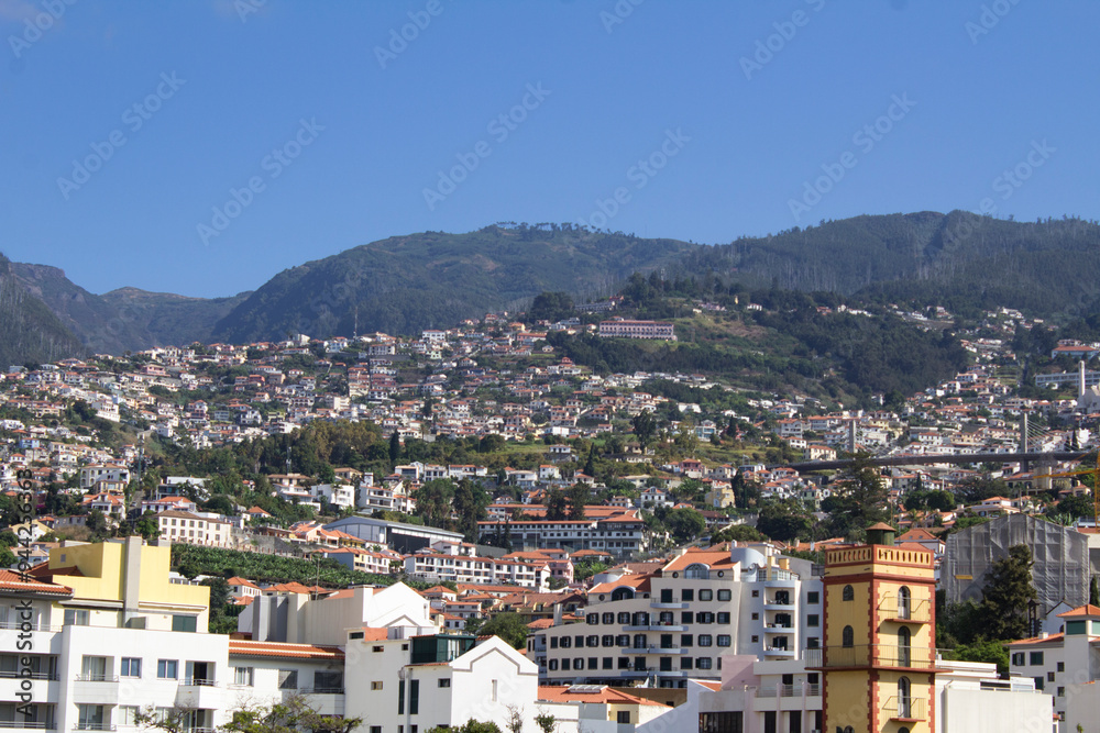 Beautiful view of the city on a summer day. Top view. Funchal. Madeira. Portugal. Beautiful view of the city on a summer day. Top view. Funchal. Madeira. Portugal.