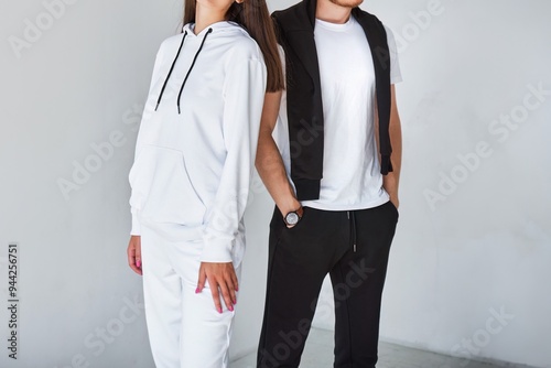 Fényképezés Casual matching outfits for men and women in hoodies