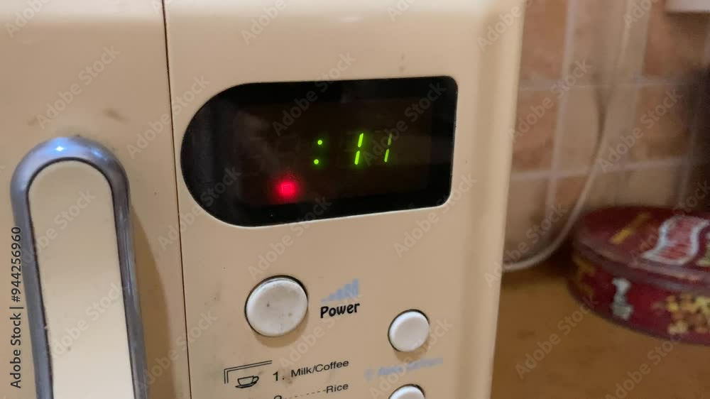 A microwave timer displaying seconds on the screen. A microwave timer displaying seconds on the screen.