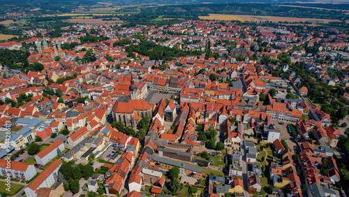 An aerial panorama view of the old town around the city Naumburg in Burgenlandkreis in Germany on a summer day.