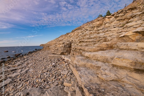 UN Climate Change Conferences. Beautiful rocky sea shore. Baltic limestone cliff. Estonia Saaremaa photo