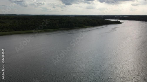 Fly over the a green and scenic nature area called Jabelscher See which is located at the Mecklenburg Vorpommern Lake area as the known former East Germany region photo