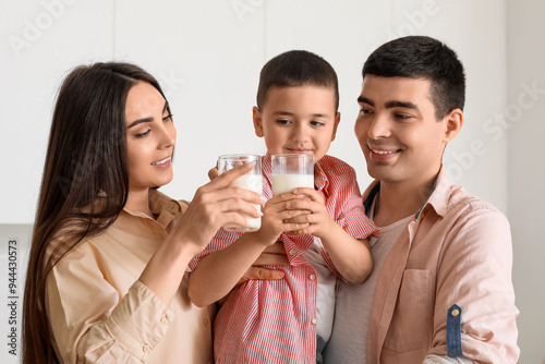 Little boy with his parents...