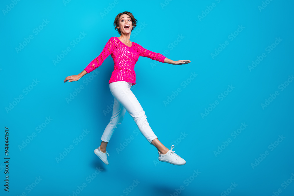 Φωτογραφία Full length photo of funky sweet lady dressed pink knitted shirt jumping high wa