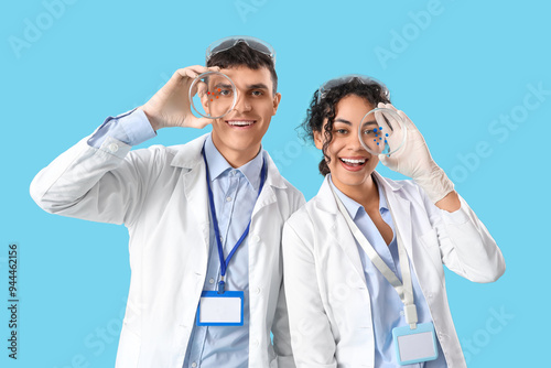 Young chemists with Petri d...