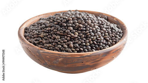 Wooden bowl filled with black lentils, set against a clear background, ideal for cooking, recipe, or food-themed design tasks