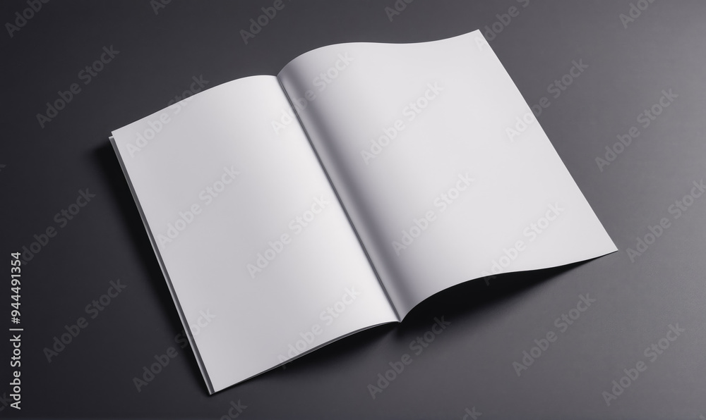 A blank magazine mockup is open on a gray surface A blank magazine mockup is open on a gray surface
