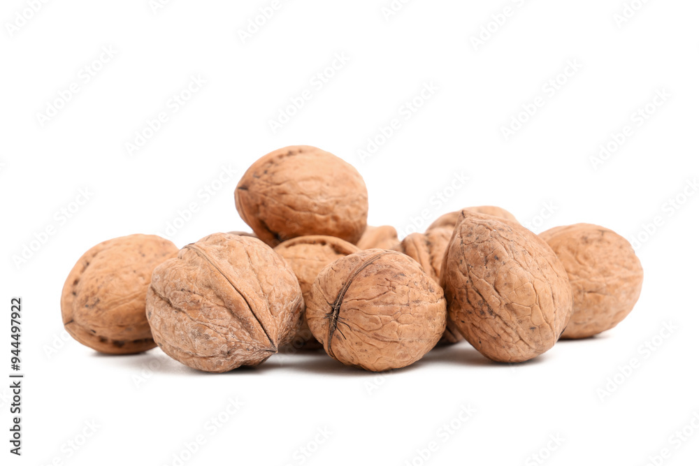 Many tasty walnuts on white background Many tasty walnuts on white background