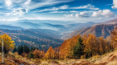 A panoramic view of mountains adorned with colorful autumn foliage