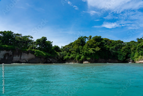 Stunning Tropical Island in Bocas del Toro, Panama with Crystal Clear Caribbean Waters, Lush Green Forest, and Vibrant Coastal Scenery, A Paradise for Nature Lovers and Eco-Tourism Enthusiasts