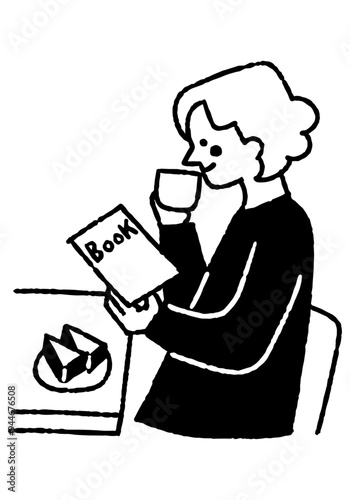 Woman reading a book while drinking coffee_2