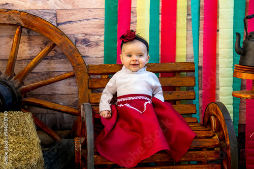 Gift in Gaucho clothing in a traditionalist setting photo