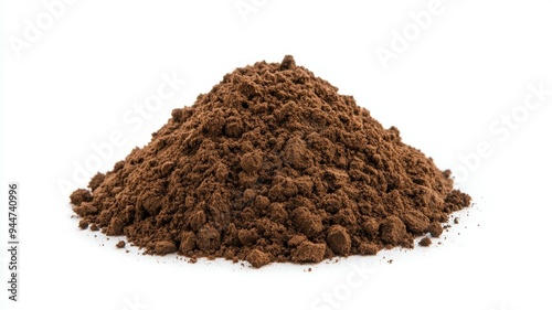 A pile of brown dirt on a white background