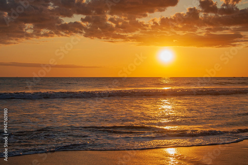 A yellow sunset on the beach