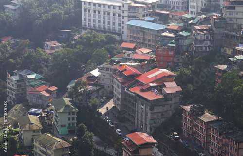 birds eye view of beautiful and colorful cityscape of gangtok hill station, located on himalayan foothills area in sikkim, north east india