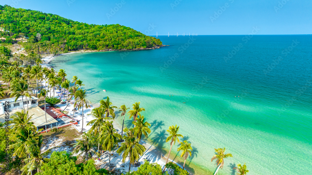 Aerial view of Phu Quoc Island Coastal Scenery (Khem Beach), Vietnam. Emerald Bay, a Popular Tourism Destination for Summer Vacation in Southeast Asia, with Tropical Climate and Beautiful Landscape. Aerial view of Phu Quoc Island Coastal Scenery (Khem Beach), Vietnam. Emerald Bay, a Popular Tourism Destination for Summer Vacation in Southeast Asia, with Tropical Climate and Beautiful Landscape.
