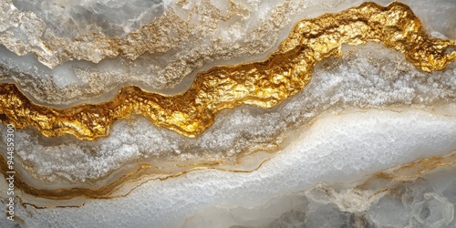 a vein of gold in quartz rock, with the metallic sheen of the mineral contrasting against the white matrix