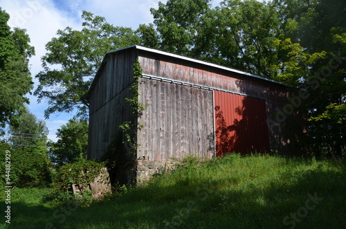 old red barn in the countryside